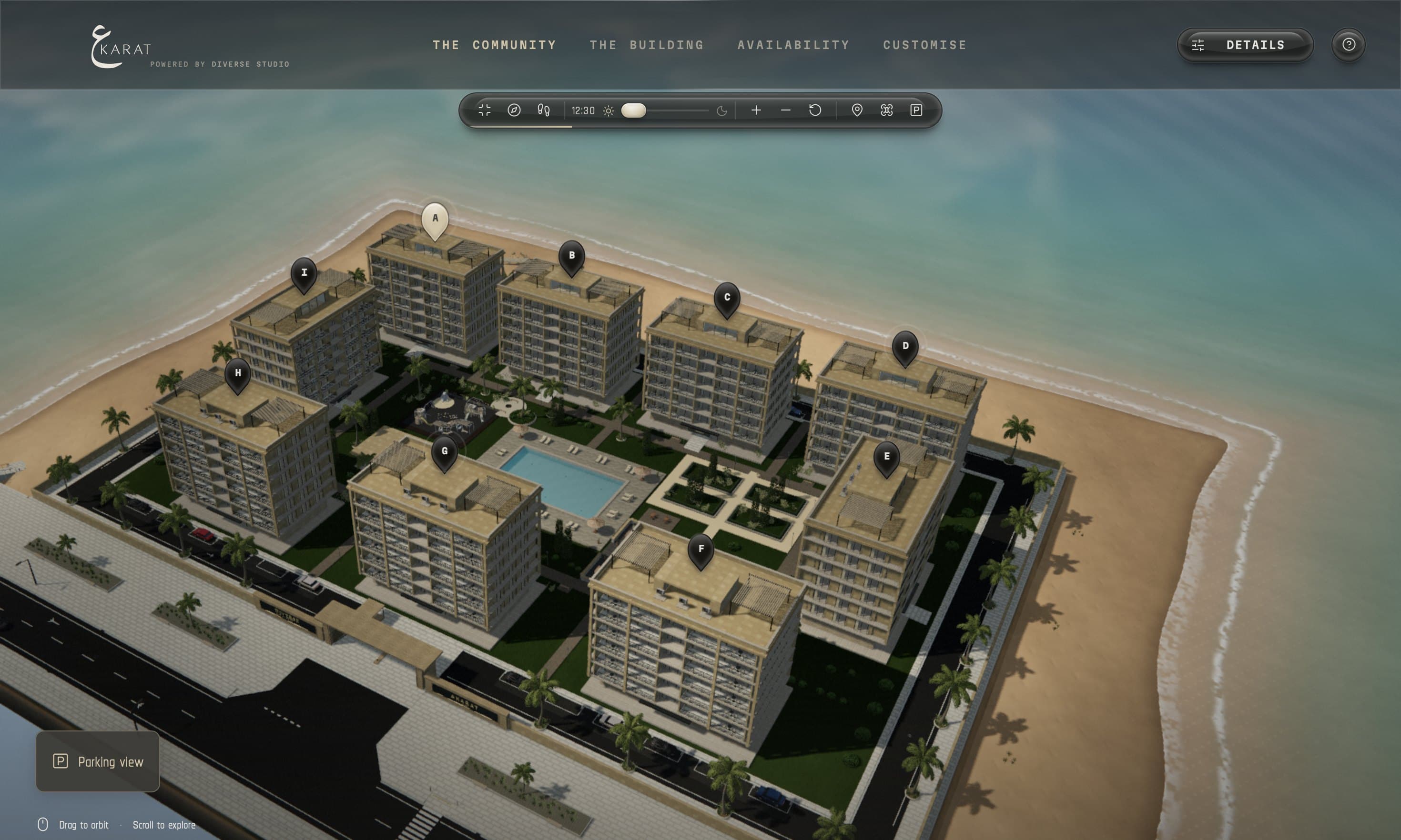 Aerial view of nine residential blocks around a pool, beside the beach